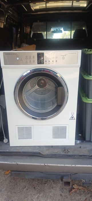 Repaired dryer loaded in service van after a mobile repair
