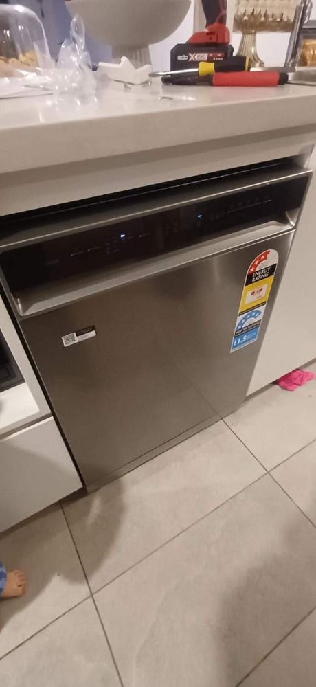 Stainless steel dishwasher installed in a Sydney kitchen